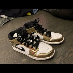 Gold/black/white Jordans